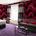 The Iconic Beverly Hills™ Banana Leaf Wallpaper - Sultry Sunset Magenta